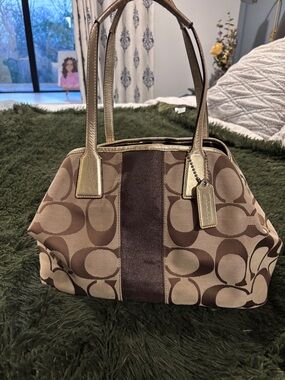 Coach Signature Canvas Shoulder Bag in Brown with Metallic Gold Trim